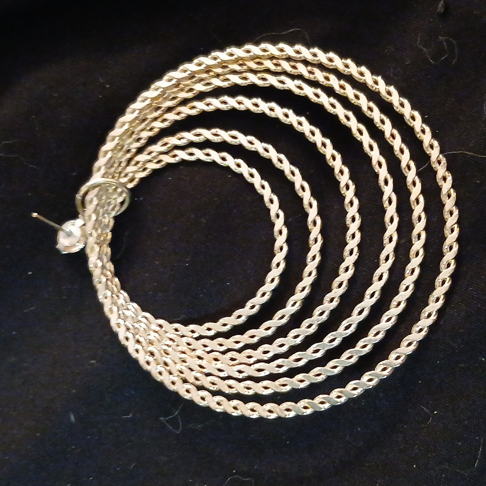 Multi hoop silver earrings. 3 inch by 3 inch. Medium weight